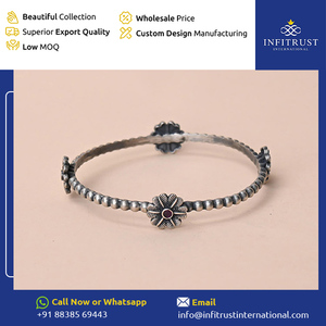 Exhibiting Highest Standard Quality Best in Supplying Floral Motif Oxidised Silver <b>Ruby</b> Stone Studded Girls Ethnic Wear Bangles - Product Image 2