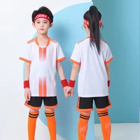 Camiseta de fútbol de manga corta con logotipo personalizado y precio al por mayor, ropa de entrenamiento de fútbol para niños OEM con logotipo infantil para hombres y niños