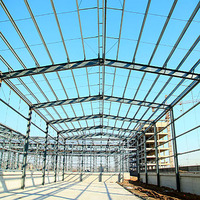 Hangar de stockage à grande portée en structure métallique préfabriquée galvanisée à toit courbé pour entrepôt et atelier