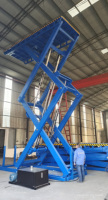 Plateforme élévatrice industrielle à grande capacité de 12 tonnes, plateforme élévatrice à ciseaux en acier au carbone, table de travail surélevée pour le chargement et le déchargement de marchandises