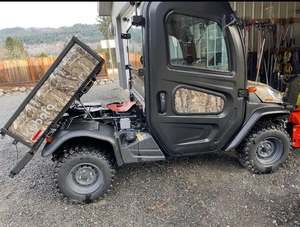Nuevo Kubota RTV 1100C UTV, Vehículo Utilitario Cerrado, Diésel, 4x4, Semiautomático, para Transporte Agrícola, Certificado por la EPA, Motor de 4 Tiempos, 1000W - Product Image 1