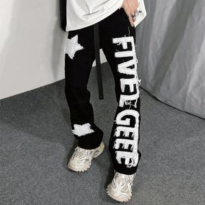 กางเกงวอร์มขาบานของผู้ชายกางเกงวอร์มขาบานผ้าปักลาย - Product Image 1