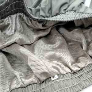 ชุดแจ็คเก็ตและกางเกงวอร์มแบบมีฮู้ด กันลม กันน้ำ สีพื้น ผลิตตามแบบ OEM สำหรับกีฬาและแฟชั่น - Product Image 6