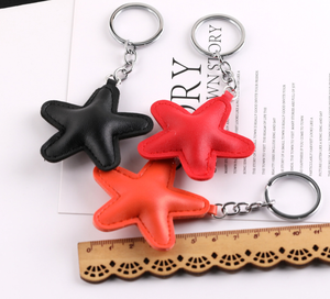 Wholesale New Design Bag Charms Doll Key Charms 3D Star Pu Leather Cute Keychain in Bulk
