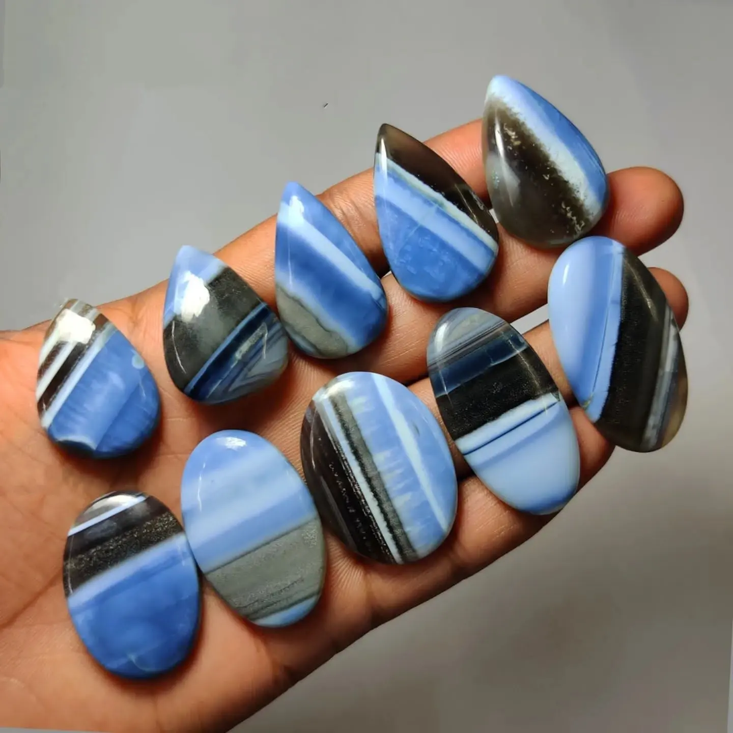 Blue Owyhee Opal natural blue opal cabochon gemme sciolte prezzo all'ingrosso all'ingrosso tutte le dimensioni e forme disponibili