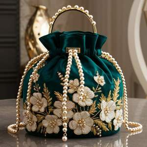 2025 @ Stylish Bottle Green Potli Bags sobre tela de seda con perlas adornadas, cuentas de cristal, trabajo 3D para fiesta/boda - Product Image 1