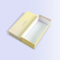 Boîte cadeau rectangulaire rigide jaune pâle minimaliste personnalisée en gros avec couvercle et base pour cosmétiques et montres