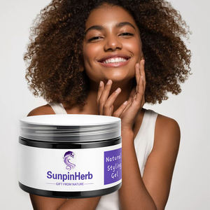 Crème coiffante pour cheveux bouclés naturels, contrôle de l'hydratation, définition des boucles, tenue souple et soin anti-frisottis - Product Image 1