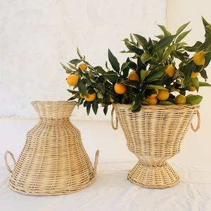 Exquisito jarrón de urna de ratán hecho a mano, jarrón decorativo de urna con patas de mimbre Natural tejido a mano para decoración de hogar, Hotel y restaurante - Product Image 1