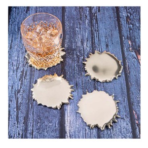 Sous-verre à thé en métal doré 2025 - Product Image 1