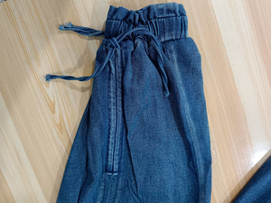 Colección primavera 2025, pantalones vaqueros holgados con revestimiento para mujer, pantalones acampanados elásticos de cintura alta con cordón y diseño transpirable - Product Image 4