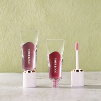 Gloss à lèvres personnalisé OEM Rouge Nude Ultra-brillant Non collant Éclat vibrant Vitamine E Végétalien Bio Longue tenue Imperméable Vente en gros Faible MOQ