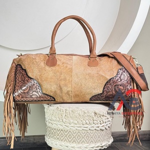 Premium Quality Hand Tooled Cowhide Fringe Travel Bags Genuine Leather Hair-On Cowhide Overnight Duffel Bag for Men & Women's - Product Image 1