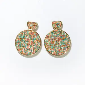 beaded circle earrings - coral/black
