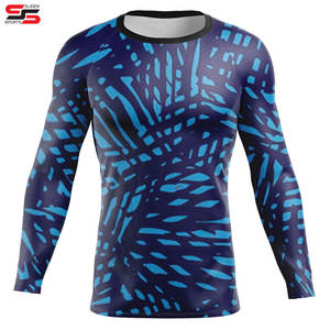 Dernière conception de vêtements de sport pour hommes Rash Guard couleur unie manches longues avec impression de logo personnalisé en gros personnalisé - Product Image 1