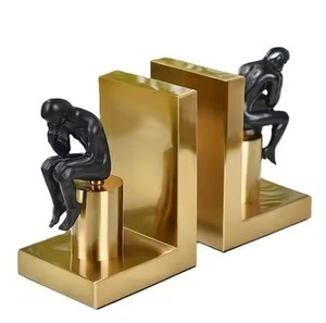 Paire de serre-livres en métal uniques et modernes pour la bibliothèque à domicile, porte-livres décoratif qui ajoute une touche d'élégance artistique à la décoration des étagères - Product Image 1