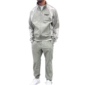 Tendance Zipper Veste et Pantalon 100% Nylon Poids Lourd Logo Personnalisé Goutte Épaule Coupe-Vent Survêtement Pour Hommes - Product Image 1