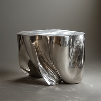 Table console artistique moderne en aluminium socle sculptural torsadé finition argent poli meubles de salon de luxe décor