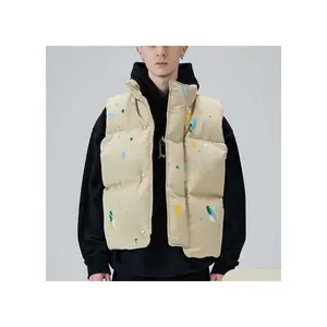 Logo personnalisé polyester vers le bas poids lourd chaud sans manches vestes peinture Splash-encre Puffer hommes gilet d'hiver