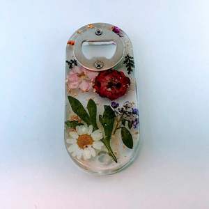 Resin and metal bottle opener featuring hand painted accents and traditional shape for classic home or bar decor - Product Image 6