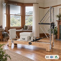 Reformer Pilates multifonctionnel silencieux en demi-trapèze avec cadre en bois de chêne professionnel 2 en 1 pour studio de fitness