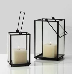 Lanterne à bougie en fer fabriquée par un artiste avec une forme sculpturale et un design à flamme nue, parfaite pour les salles d'exposition et les espaces créatifs - Product Image 3