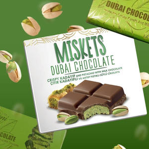 Venta al por mayor Miskets Dubai Barra de chocolate con avellanas 100g Precio de fábrica Venta caliente de calidad superior Suministro de aperitivos de chocolate con leche barato - Product Image 6