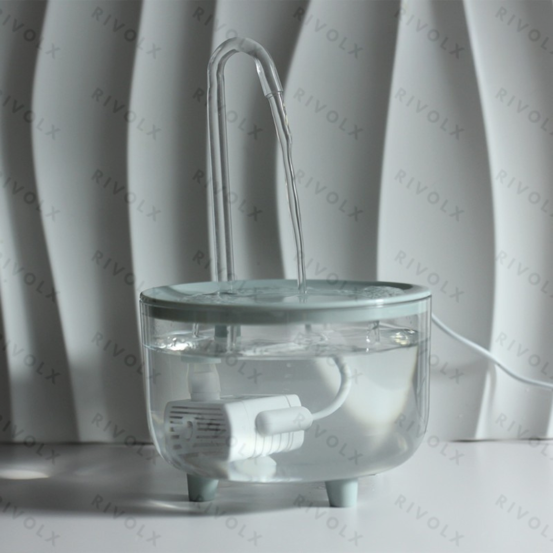 Petit distributeur d'eau en tube de cristal avec couvercle rond vert en PET