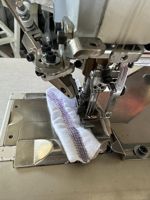 Machine à coudre à point de recouvrement à trois aiguilles et cinq fils PEGASUS CW600 d'occasion