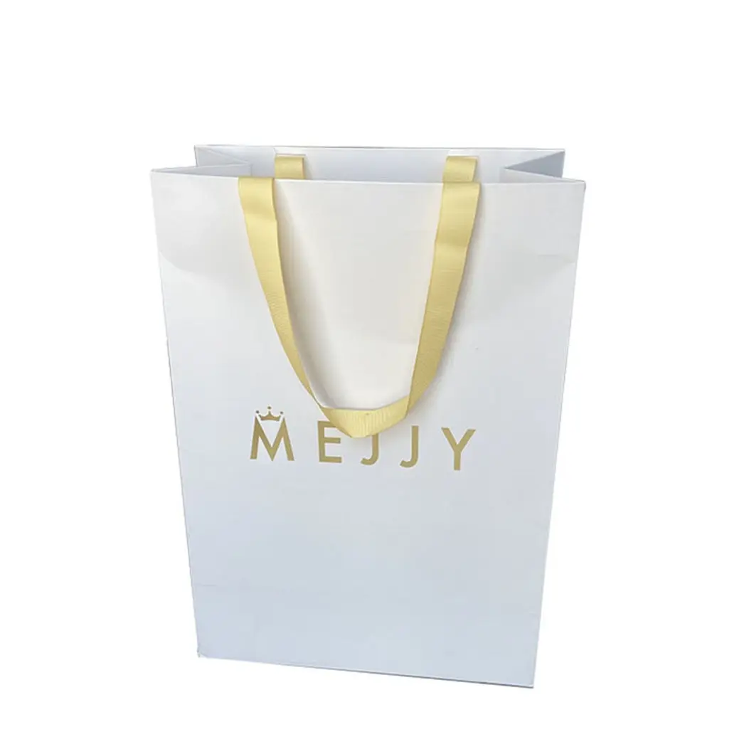 Bolsa de papel de regalo de compras de lujo blanca impresa personalizada al por mayor con asa bolsas de papel de lujo con su propio logotipo