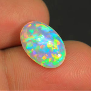 Merveilleuse pierre précieuse opale éthiopienne lisse polie forme ovale Welo brillant Multi Flashy cabochon opale éthiopienne pour la fabrication de bijoux - Product Image 1