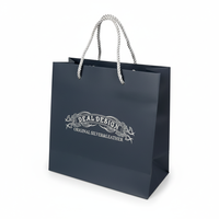 Tas Hadiah Mewah Biodegradable Berembos Logo Kustom Desain Bunga Biru Tua Pegangan Pita Flexiloop Kertas Seni Jam Tangan Kacamata