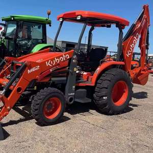 Trouvez des offres similaires pour un tracteur KUBOTA M62 TLB LOADER BACKHOE d'occasion, en bon état, à prix avantageux, 62 ch. - Product Image 1