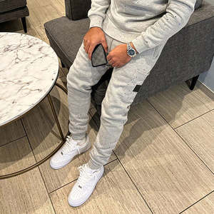 กางเกงวิ่งขากระบอกของผู้ชาย,กางเกงวอร์มทรงหลวมมีกระเป๋าลายสตรีท - Product Image 5