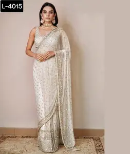 Abbigliamento da festa indiano e sari a rete in stile Bollywood con sequenza arcobaleno latteo fantasia e sari da lavoro con bordo filettato con camicetta