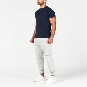 Logo personnalisé pour hommes T-shirt de sport coupe ajustée Vêtements de sport secs Tissu tricoté à manches courtes Vente en gros de vêtements de sport personnalisés pour tous - Product Image 3