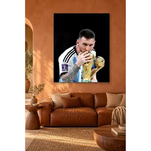 Fida Messi embrassant le trophée sur fond noir, impression sur toile - Product Image 2
