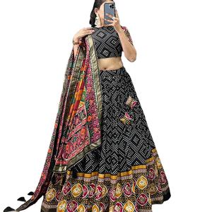 El último diseñador Tussar Silk Bandhani Printed Foil Work Lehenga Choli de Fab Zone - Product Image 1