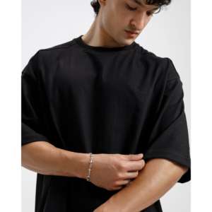 เสื้อยืดคอตตอนออร์แกนิค 100% ทรงบ็อกซี่ ดีเทลไหล่แบบพิเศษ พิมพ์ลายด้วยวิธีการพิมพ์ซิลค์สกรีนและสกรีนพิมพ์ - Product Image 5