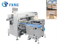 Machine d'emballage de sachets préfabriqués avec mécanisme de fermeture à torsion