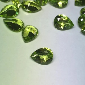 เพอริดอทดิบทรงลูกแพร์ สีเขียวมะกอก ขนาด 7x5 มม. น้ำหนัก 0.9-1.25 กะรัต รับรองโดยบุคคลที่สาม ผ่านกระบวนการเคลือบแว็กซ์/น้ำมัน เรืองแสงในที่มืด - Product Image 3
