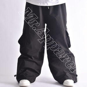 100% Pantalon de neige Baggy imperméable noir de haute qualité avec poches cargo cordon de serrage taille et bas Cinch - Product Image 1