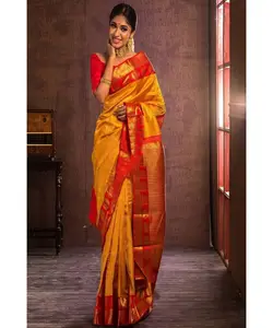 Faites une déclaration de mode dans nos saris en filet brodés à la mode, avec des détails de paillettes chics, idéaux pour les fêtes