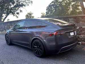 Modèle X électrique 2024 AWD d'occasion, jantes en alliage, sièges 3ème rangée, intérieur cuir, navigation, démarrage à distance, rétroviseurs électriques, éclairage - Product Image 3