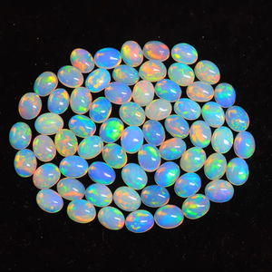 Gema de Ópalo Etíope Genuino, Tamaño 7x5mm, Forma Ovalada, Welo, Brillante, Arcoíris, Gemas de Ópalo Etíope - Product Image 1