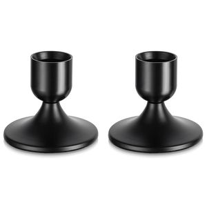 Elegante portavelas de hierro negro con diseño de desplazamiento con detalles artesanales, ideal para bodas rústicas e interiores acogedores - Product Image 1