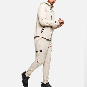 Vêtements de jogging d'entraînement personnalisés Ensemble de survêtement à capuche décontracté 100% coton pour femmes avec logo personnalisé Jogger à fermeture éclair Coupe-vent 2 pièces - Product Image 4