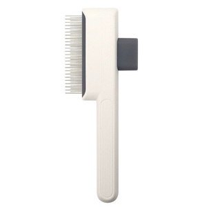 Cepillo de depilación de mascotas autolimpiante de un clic con pasadores de acero inoxidable y mango ergonómico para un aseo y baño convenientes - Product Image 3