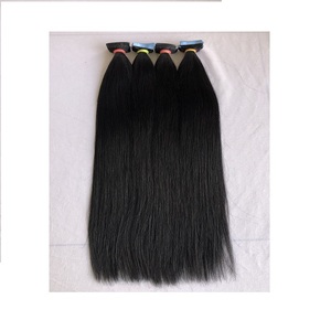 Precio al por mayor de exportación Cinta recta natural negra en 100% Extensión de cabello humano de templo indio de donante único de calidad superior natural - Product Image 1