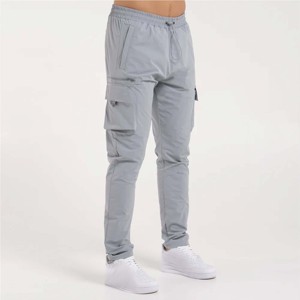 Pantalones cargo de hombre elegantes y funcionales con bolsillos seguros con cremallera y cordón ajustable - Product Image 1